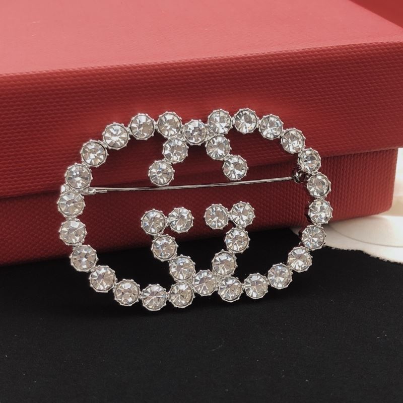 Gvc*1 brooches